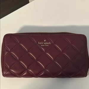 Kate Spade wallet. Zip around in cranberry. Quilted.
